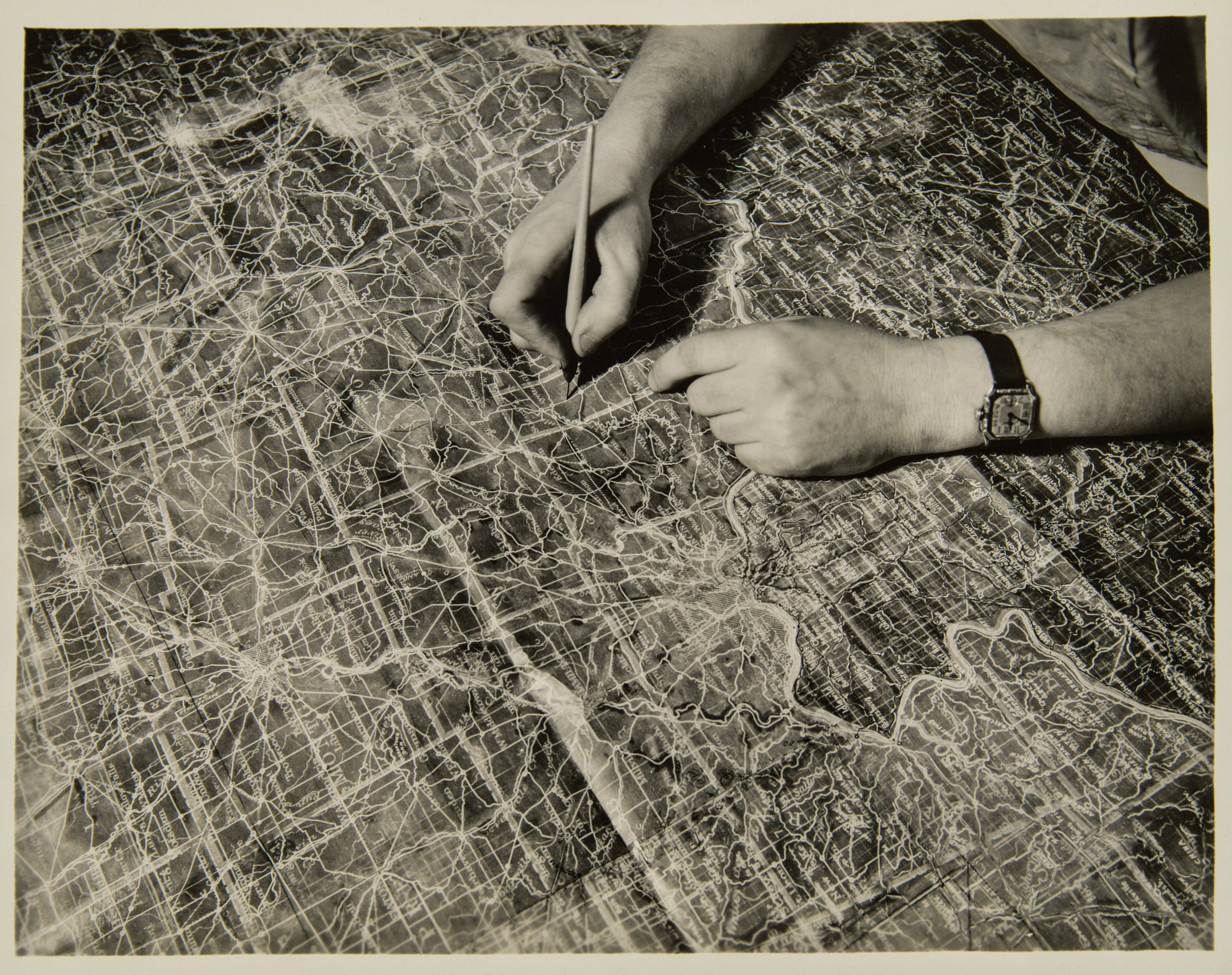 A hand drawing a map